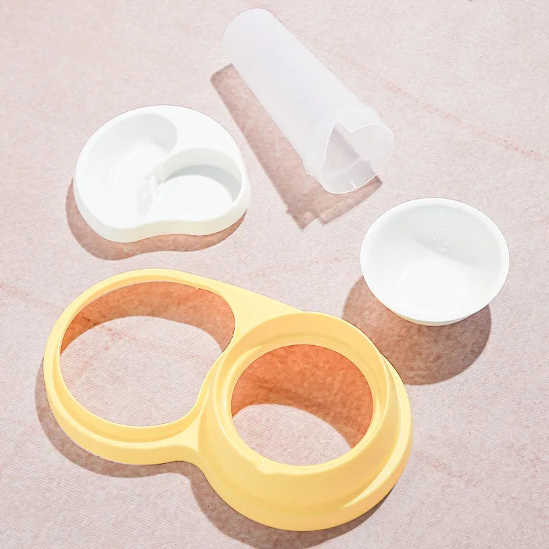 Grey ceramic dual pet feeding bowl with water dispenser and non-slip base.
