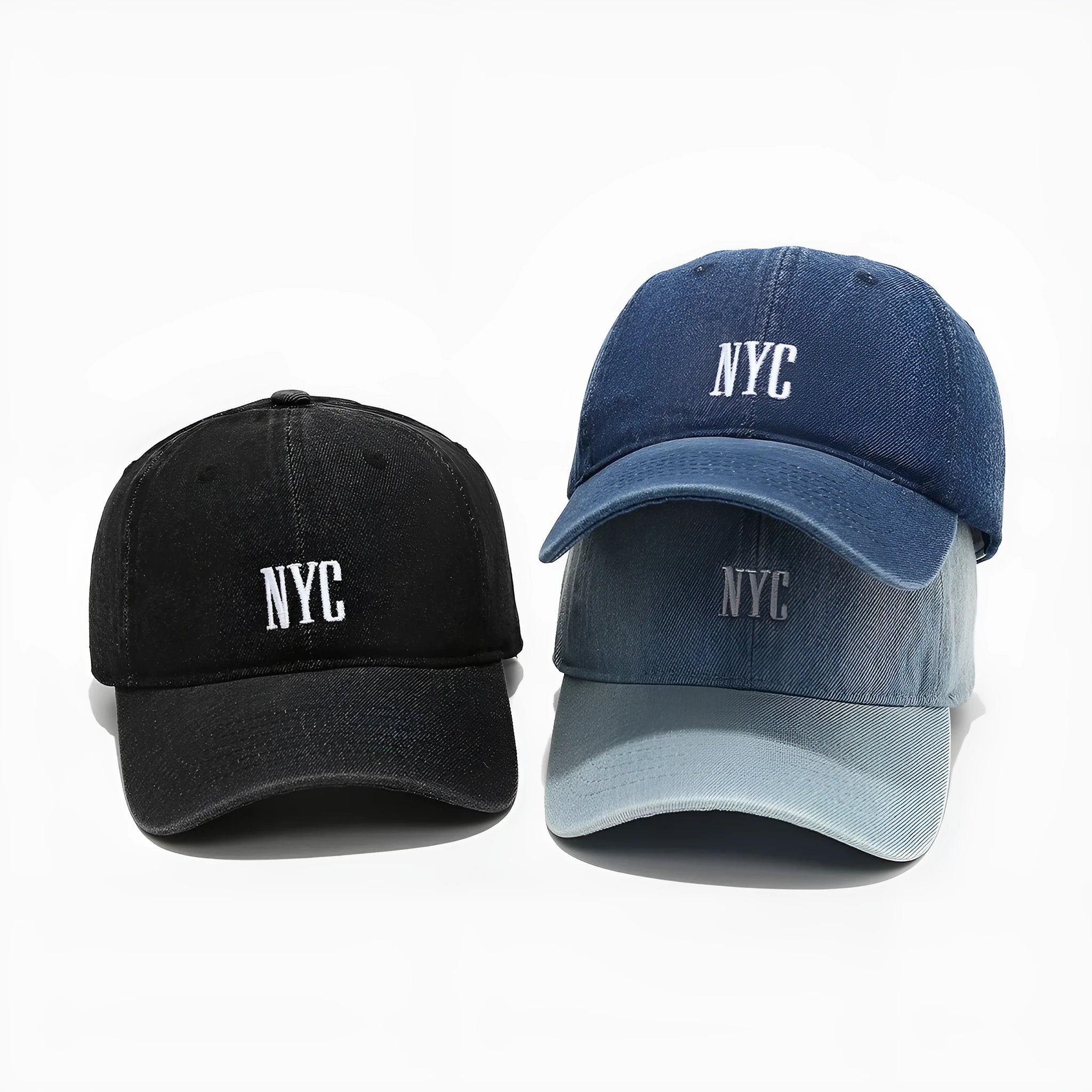 Light blue denim baseball cap with dome crown and printed alphabet letters on the front.