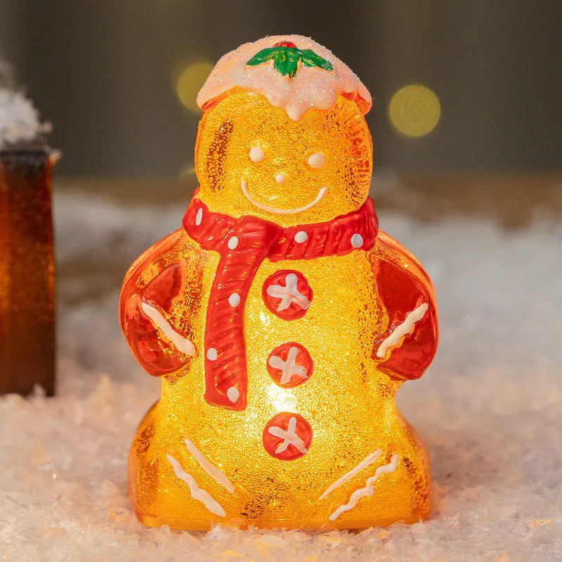 Glowing gingerbread man Christmas ornament with red scarf, plastic decoration measuring 6.5x4x10.5cm