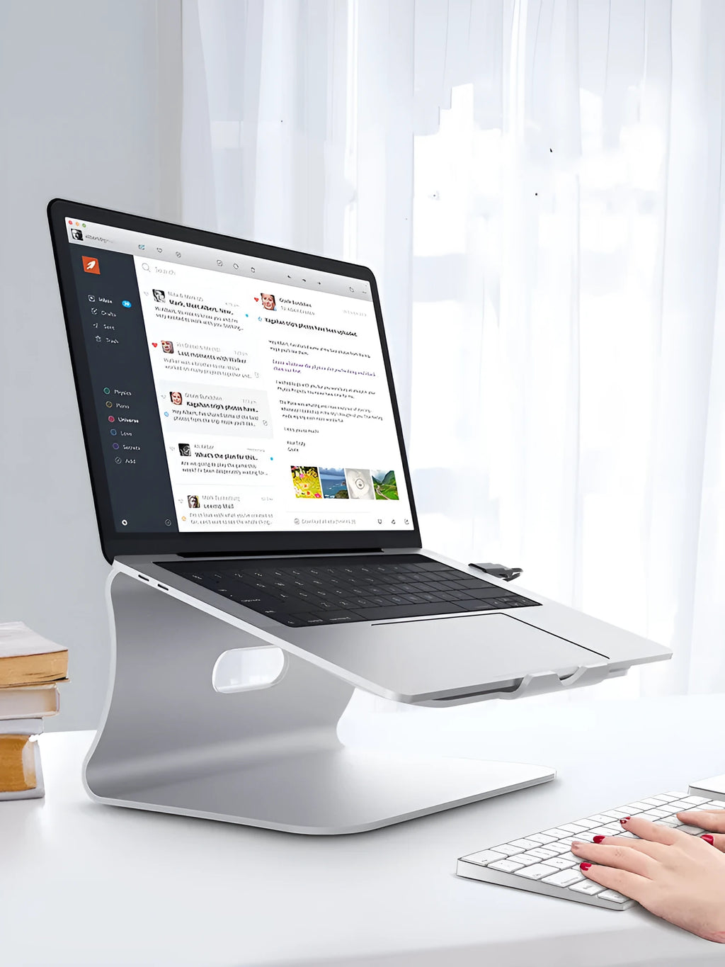 Silver aluminium laptop cooling bracket with rotating design and stripe heat sink pattern