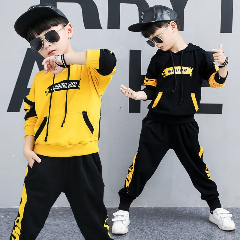 Boys yellow cotton hooded sports suit two-piece set with long sleeves and trousers.