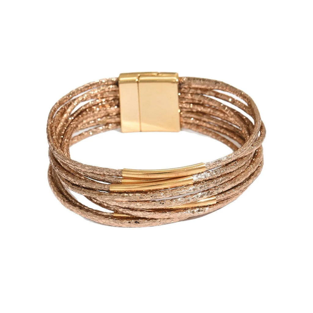 Multi-layer magnetic leather bracelet for women with round alloy element in gold, black, and coffee colours