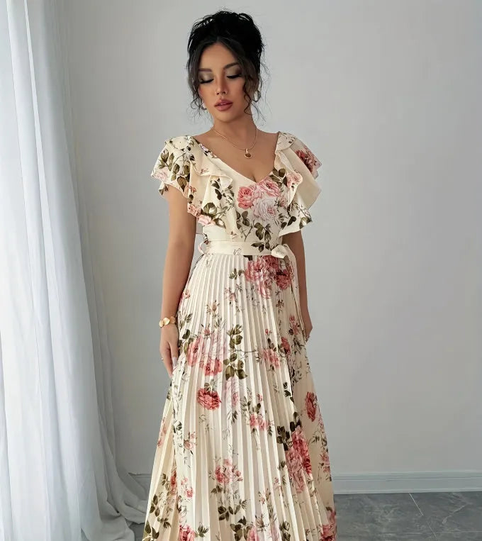 Apricot V-neck floral print dress with ruffled sleeves and an oversized swing skirt.