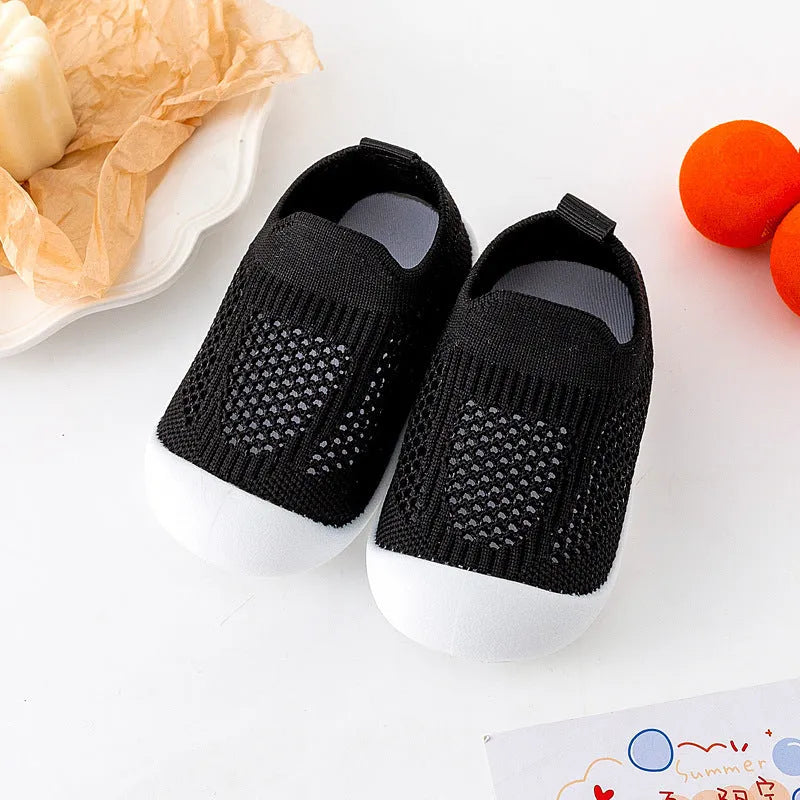 Baby soft sole non-slip walking shoes in fly woven cotton and natural rubber, available in multiple colours and sizes 11.5-15.5cm