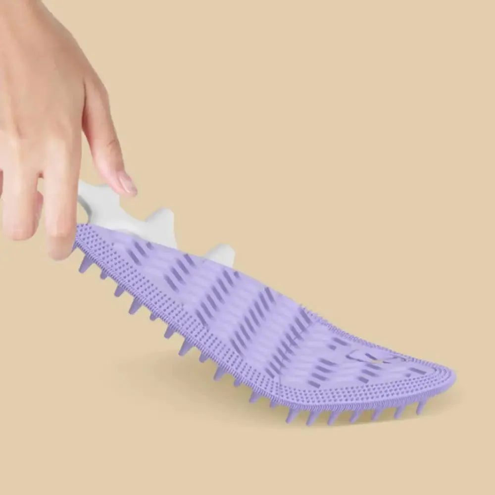 Fishbone-shaped cat brush for indoor pets, available in blue, gray, and purple colours