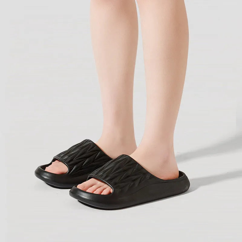 Leaf texture design EVA slippers in multiple colours on a white background.