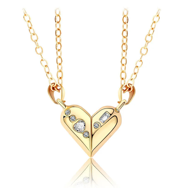 Love couple necklace pair with rotating magnet stone heart pendant in alloy and electroplating finish