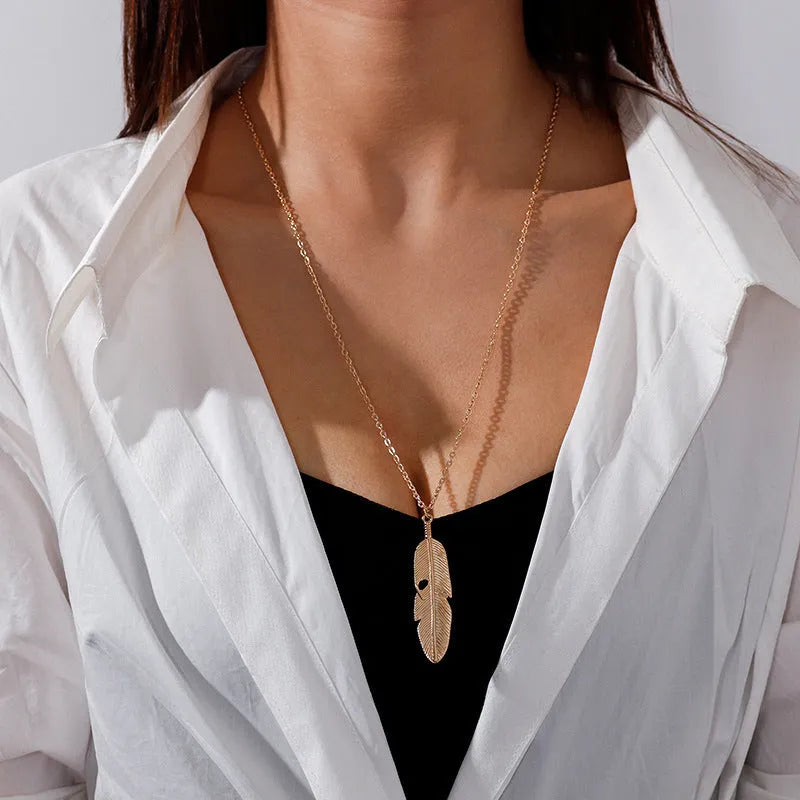 Retro feather tassel necklace for women in gold silver alloy with leaf geometry