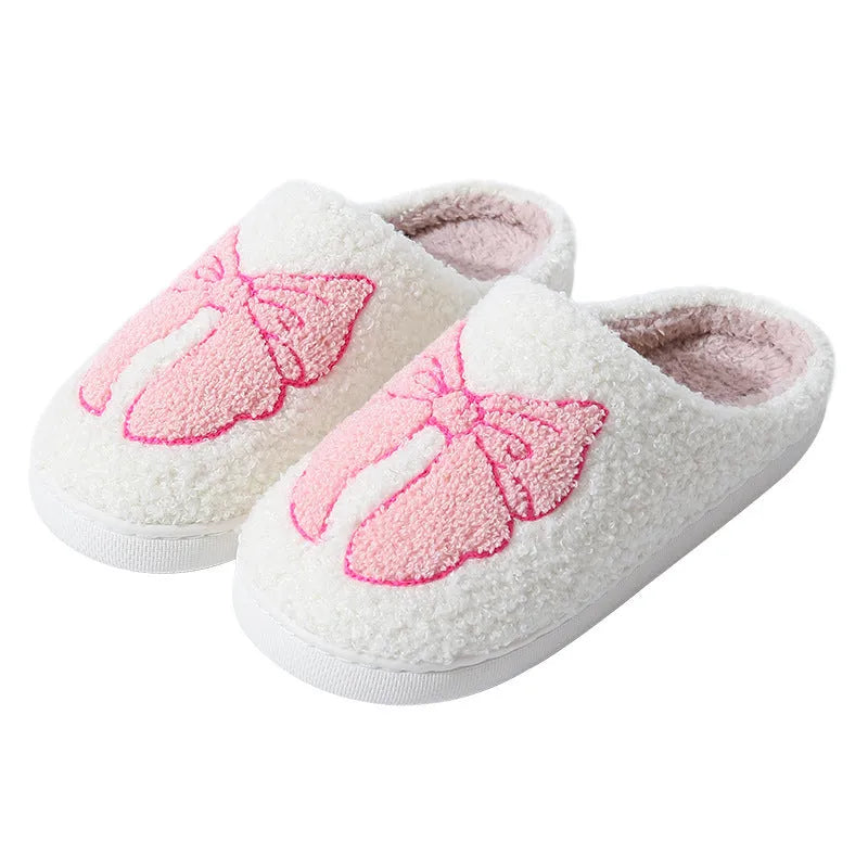 Cartoon bow knot cotton slippers in blue and pink colours with suede upper and TPR sole