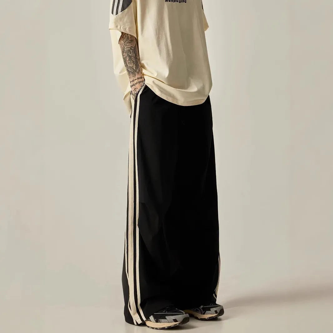 Men's black climbing trousers with high waist and straight wide-leg cut for summer wear