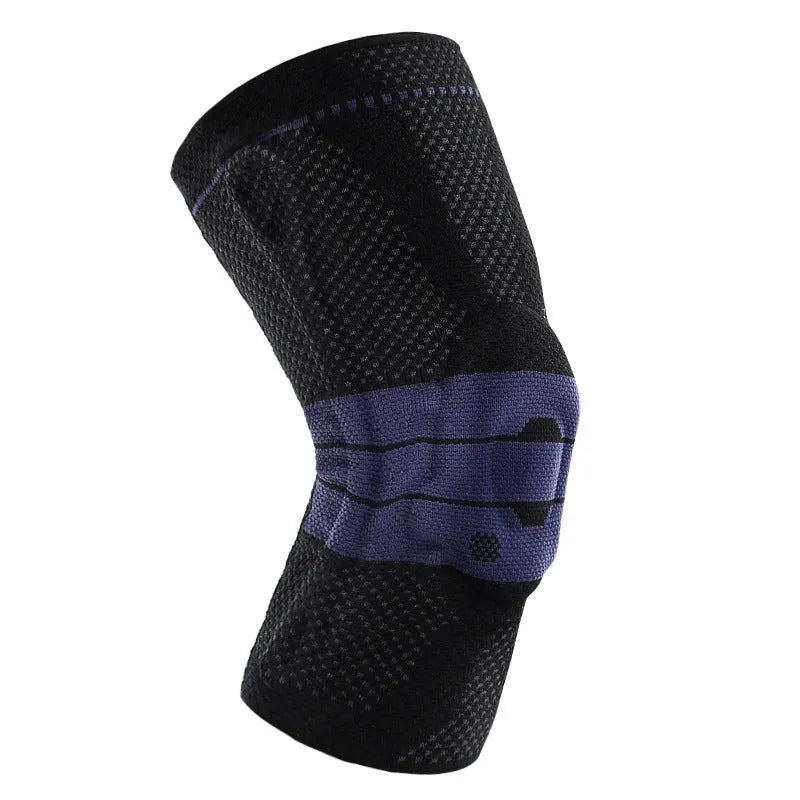 Adult black and blue sports knee pad made of nylon and spandex, shown on a knee.