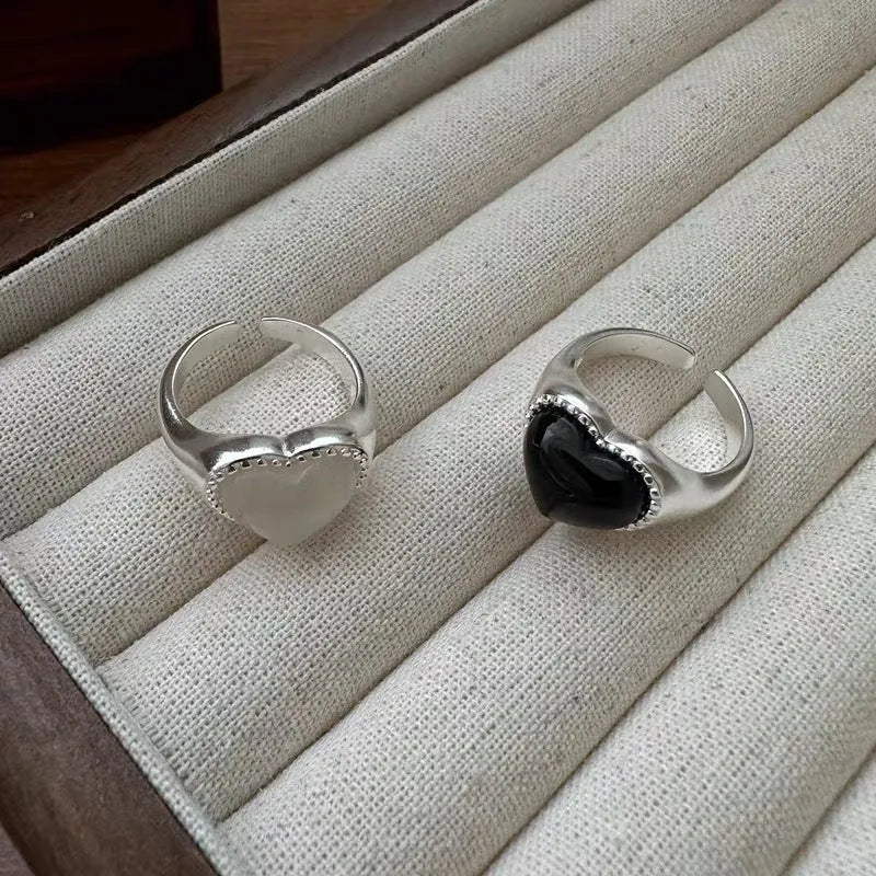S925 sterling silver adjustable ring with a black heart agate and open-mouth design detail.