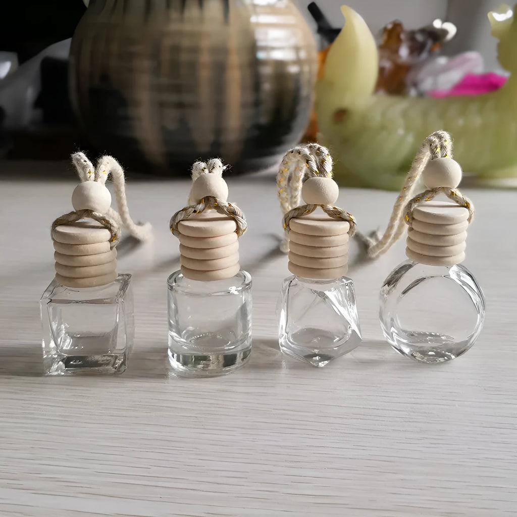 Car empty perfume bottle rearview mirror pendant with colourful rope hanging from car mirror interior