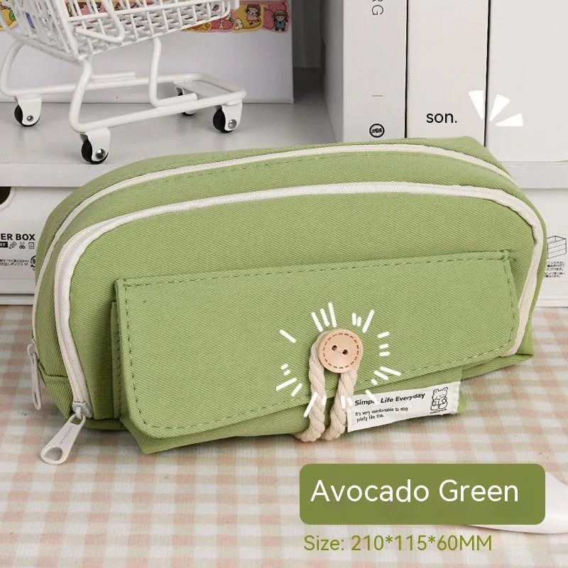 Canvas pencil case in green, beige, blue, or grey storing about 80 pens