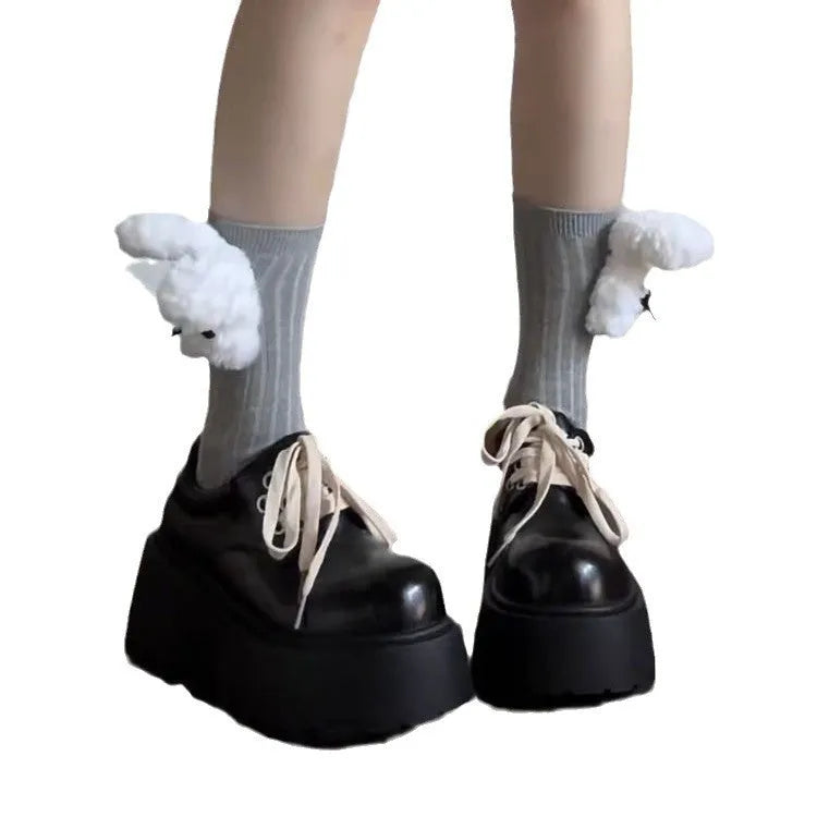 Black matte women's lace-up platform shoes with a chunky 6-8cm rubber sole and round toe.