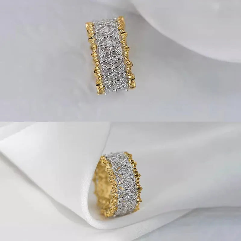 Geometric zircon ring with two-tone gold and silver electroplated finish on a copper band.