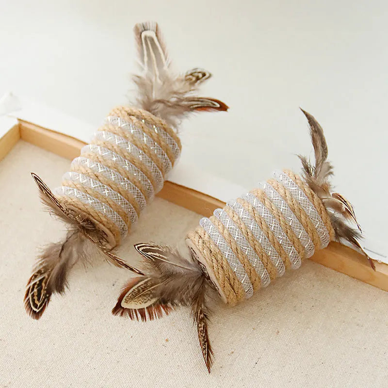 Beige interactive cat feather wand toy with hemp rope scratching surface and a catnip ball.