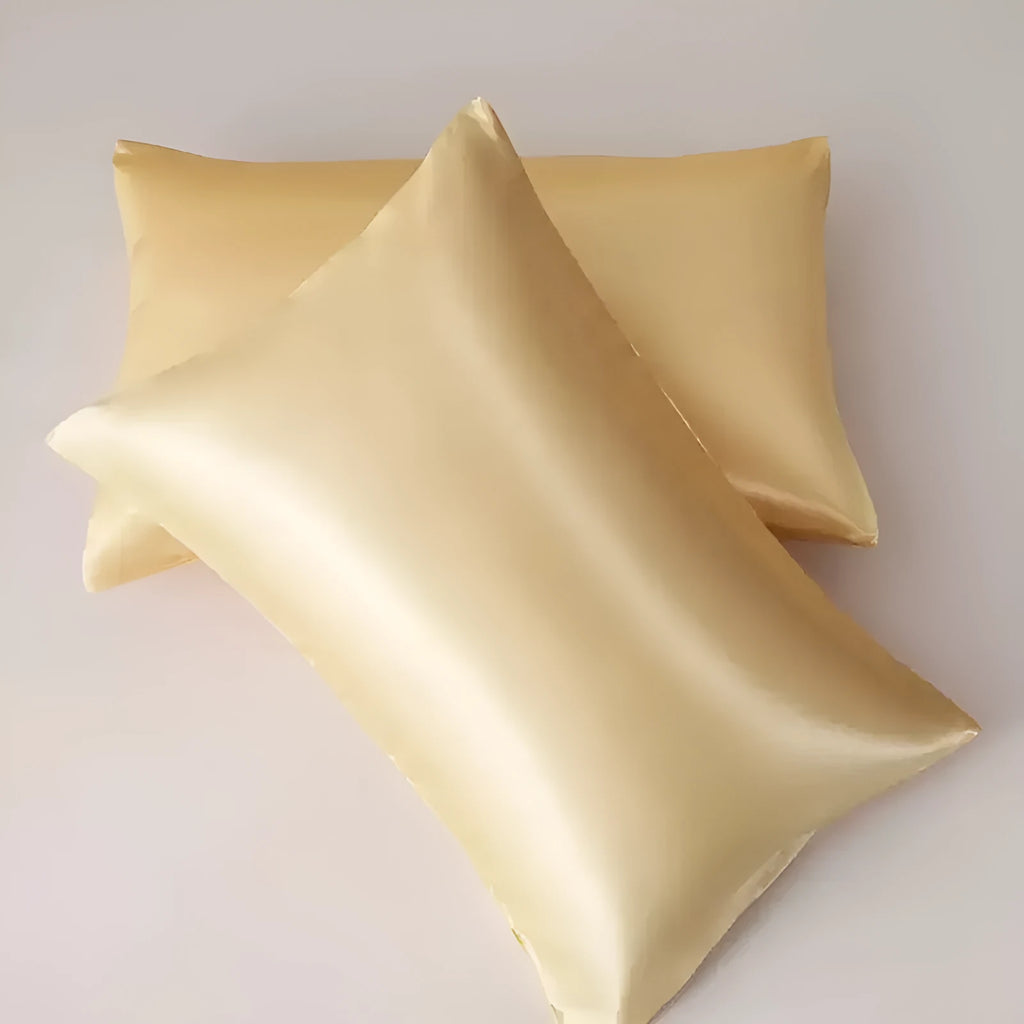 Solid colour satin pillowcase pair showing plain weave texture and available in multiple colour options