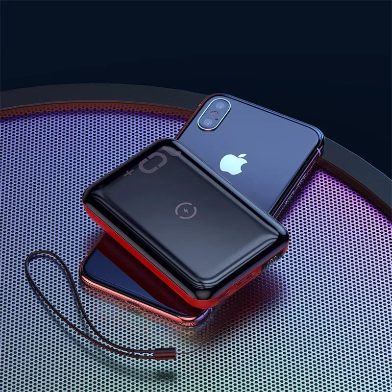 Square black wireless fast charge power bank with LED display showing battery percentage