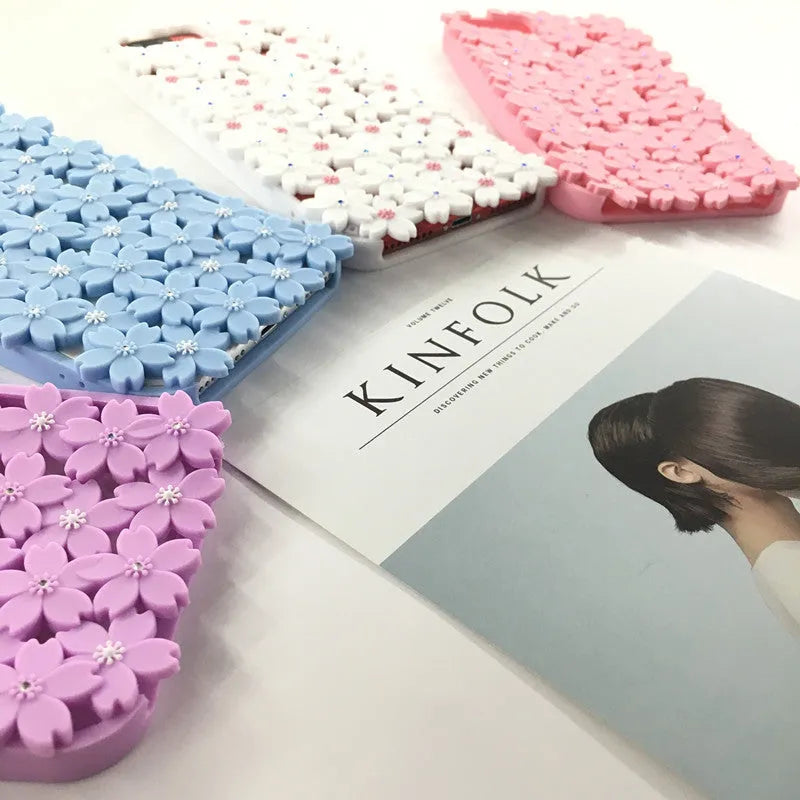 Blue silicone phone case with three-dimensional hollow flower openwork design for iPhone models