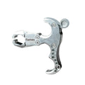 Close-up of a zinc alloy two-axis harpoon clip release aid with stainless steel mechanism.