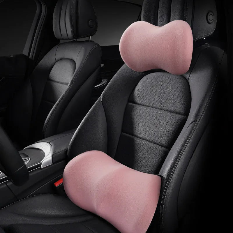 Car seat headrest pillow with ingot design and matching lumbar support cushion in grey colour