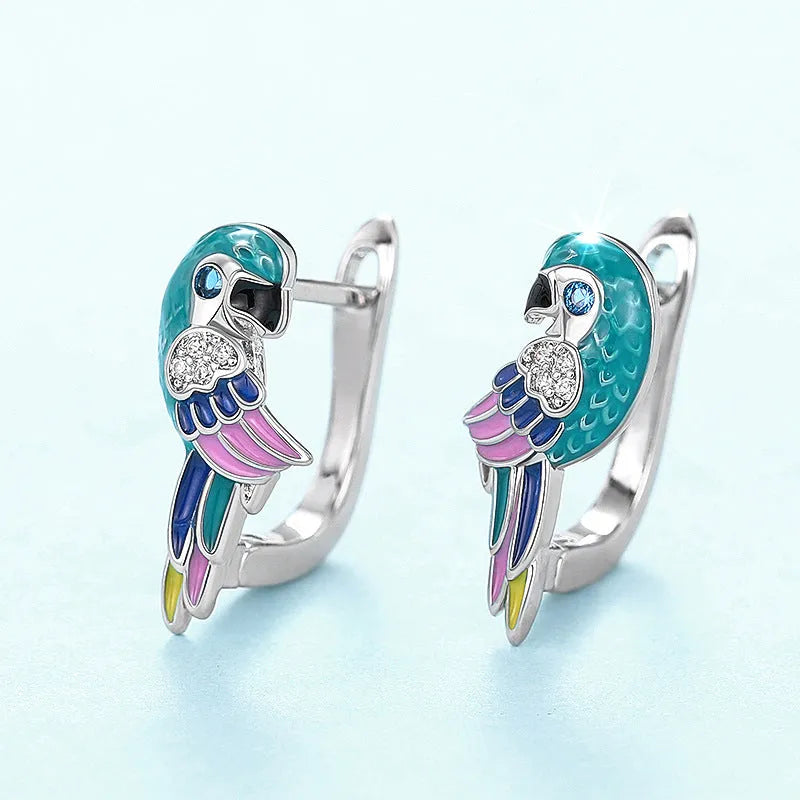White gold colour copper ear clip with inlaid zircon forming a cute simulation parrot bird ornament