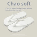 Foldable PVC beach slippers with hollow-out design and non-slip sole in black, purple and white colour options.