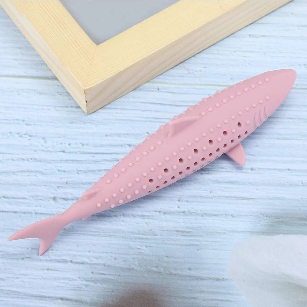 Green silicone fish-shaped chew toy for cats on a white background.