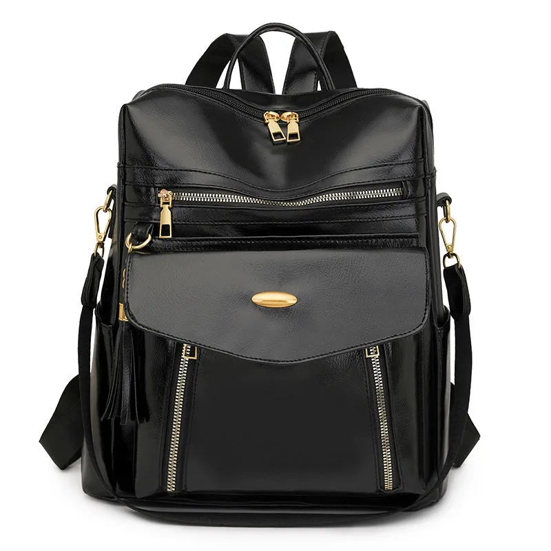 Crossbody casual ladies backpack in PU material with sewing thread detail, available in black, brown, and coffee