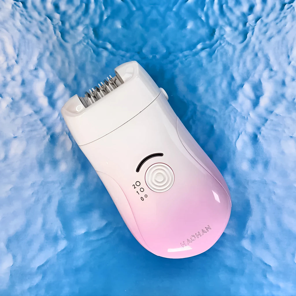 Pink three-in-one USB hair removal device with shaver head, grinding head, and skin rub accessories
