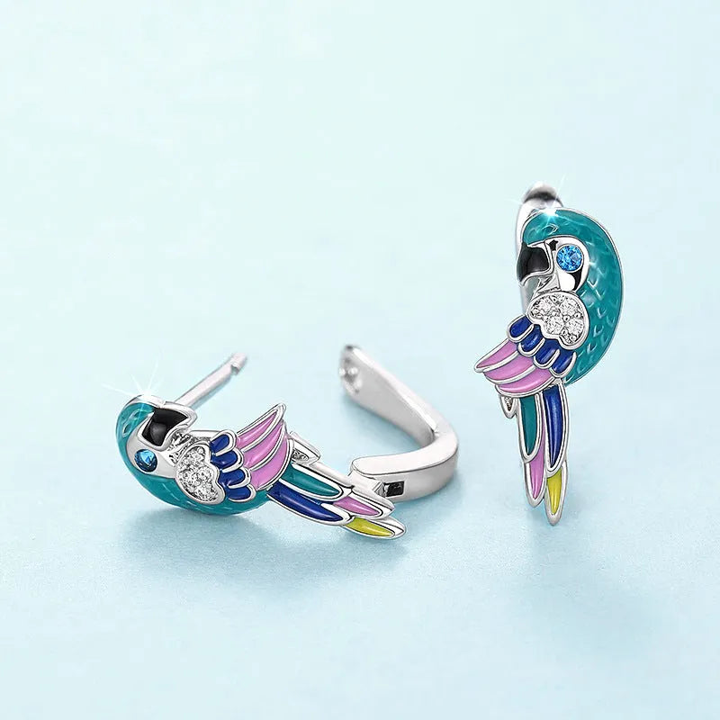 White gold colour copper ear clip with inlaid zircon forming a cute simulation parrot bird ornament