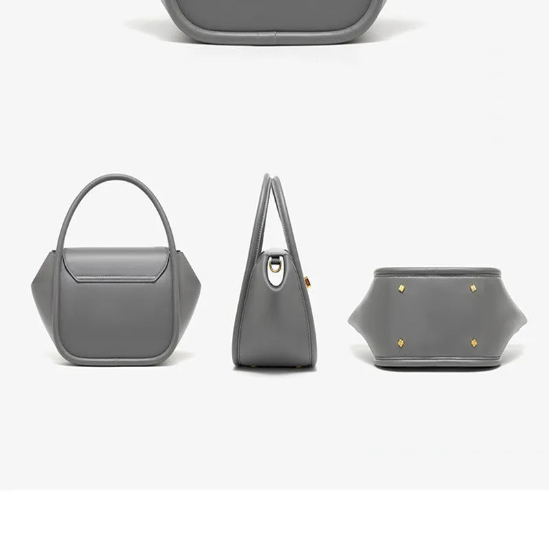 Genuine cow leather women's cross-body wing tote bag with latch closure and adjustable shoulder strap