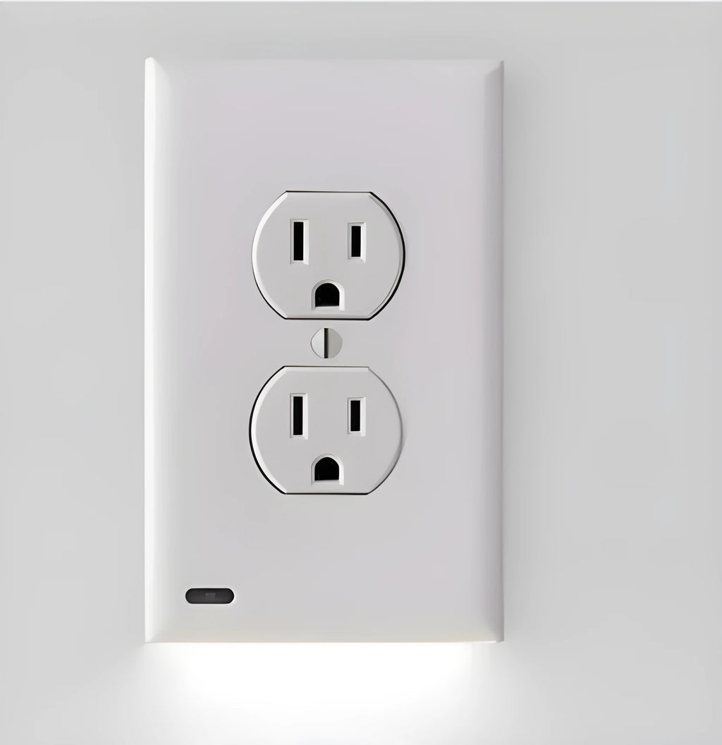 White socket induction night light plugged into wall outlet with automatic light sensor.