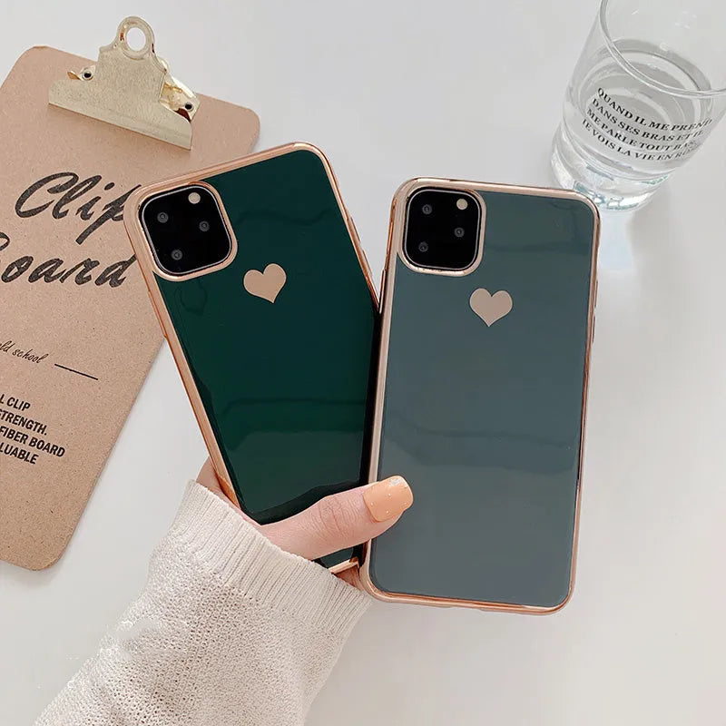 Solid colour TPU back cover phone case for iPhone, shown in blue, claret, pink, or green.