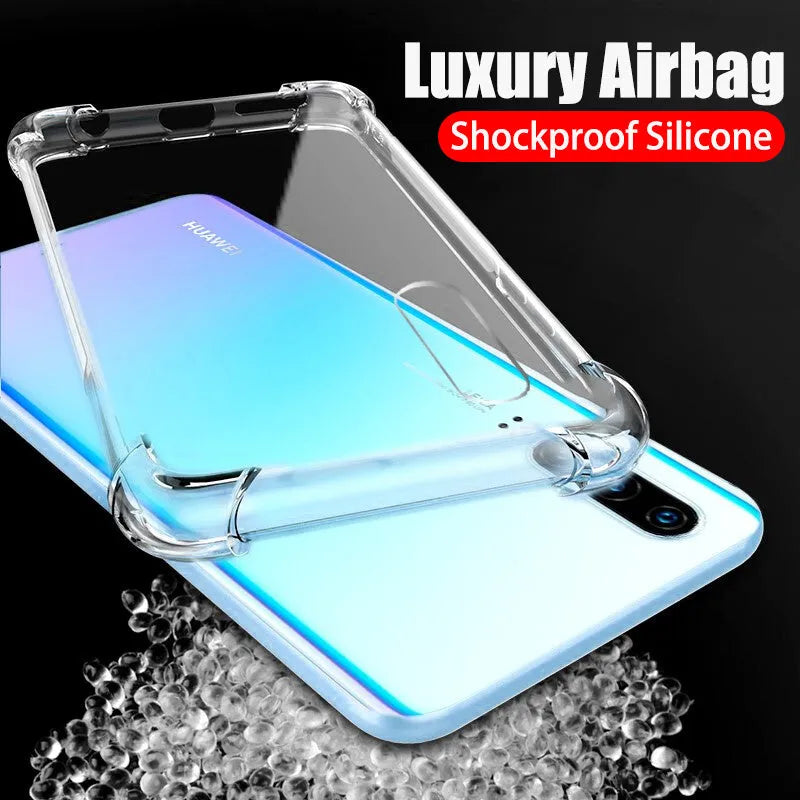 Transparent airbag drop-resistant TPU phone case for a Huawei smartphone on a table.
