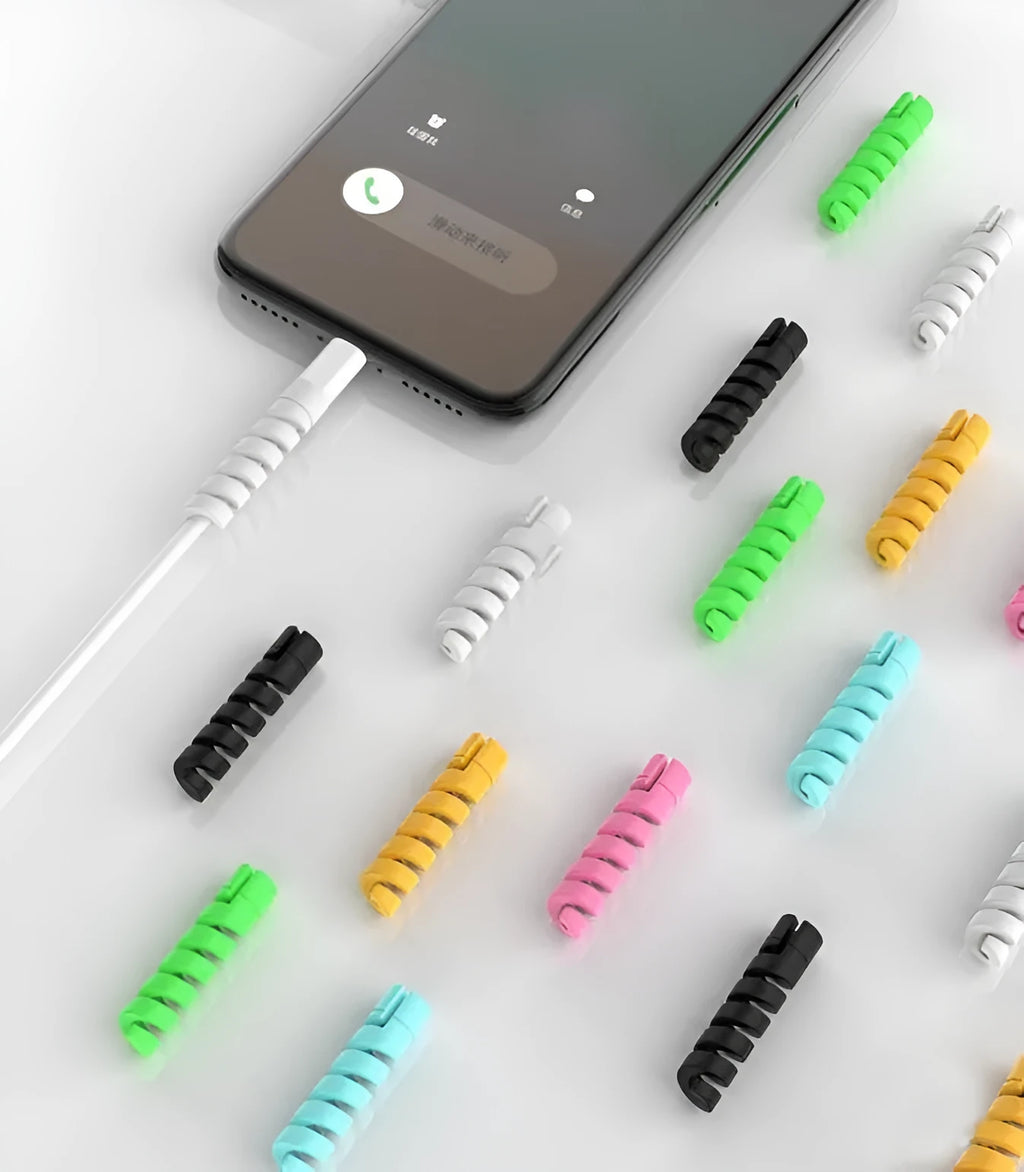 Two plastic cable protectors, 3.5cm long, in assorted colours next to a charging cable.