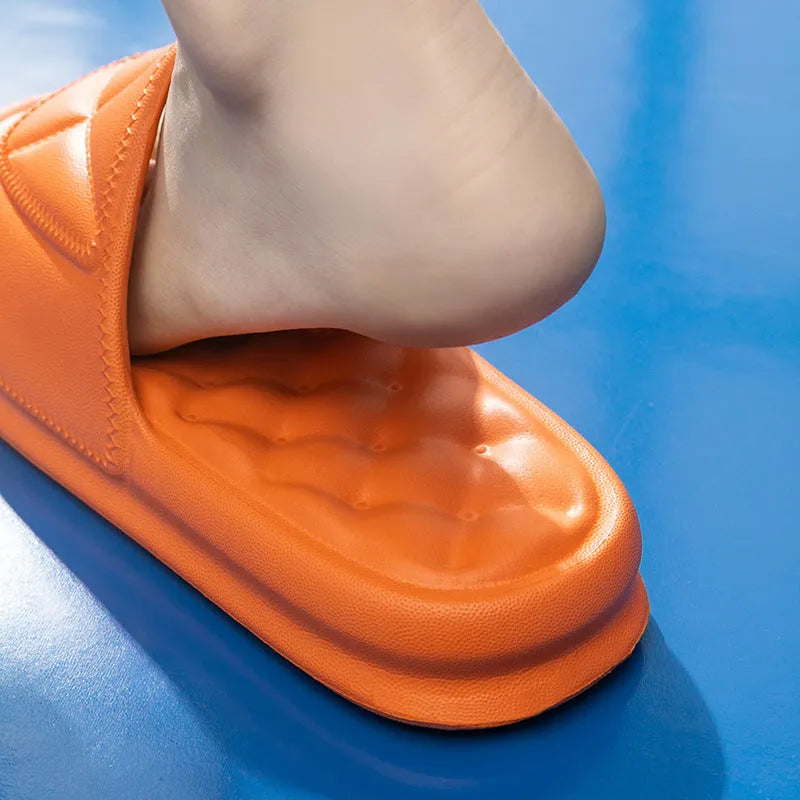 Pair of soft EVA bathroom slippers with a thick non-slip sole, shown in a selection of colours.
