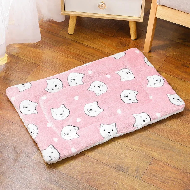 Thickened cloth pet floor mat for dogs and cats in autumn and winter, shown in a blue starry sky pattern