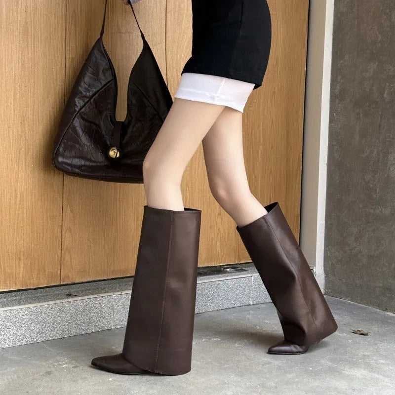 Women's black pointed mid heel riding boots with microfiber upper and rubber sole