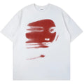 White loose fit cotton summer t-shirt with short sleeves and a round neck on a hanger.