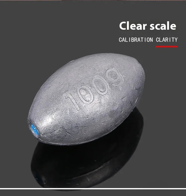 Olive lead fishing sinker with scale pattern showing rugby shape and plastic core construction