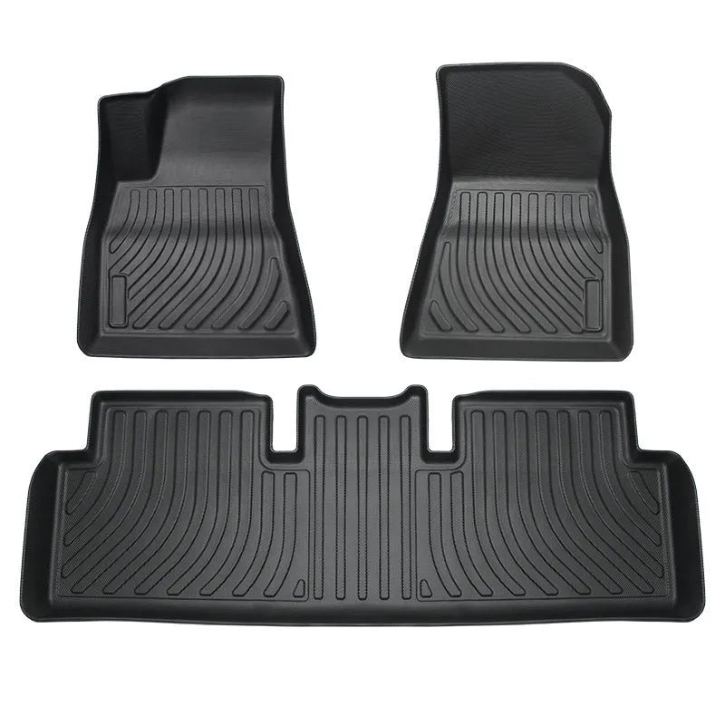 Custom rubber and TPE floor mat set for Tesla Model 3, Y, X, and S interior protection.