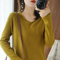Women's V-neck long sleeve knitwear top in turmeric colour with pullover style and non-ironing fabric