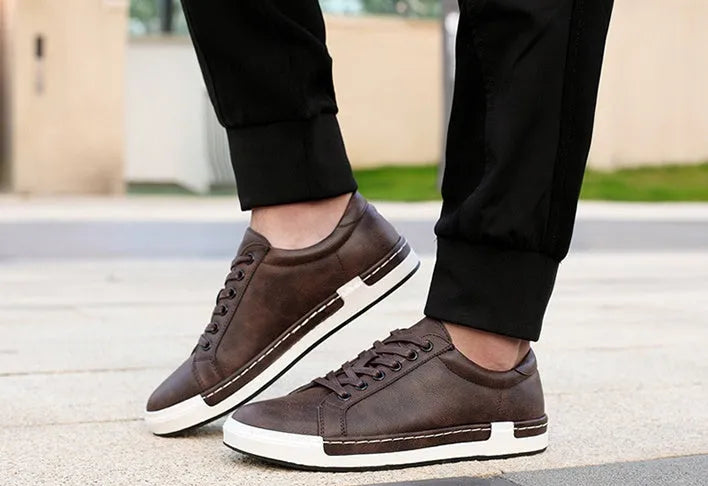 Handmade men casual shoes with rubber sole and front tie lace up in brown colour on display