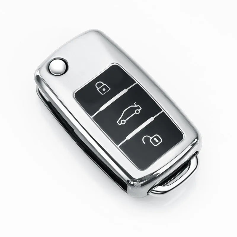 VW Model A car key case in four colours: blue, pink, red, and silver with buckle attachment