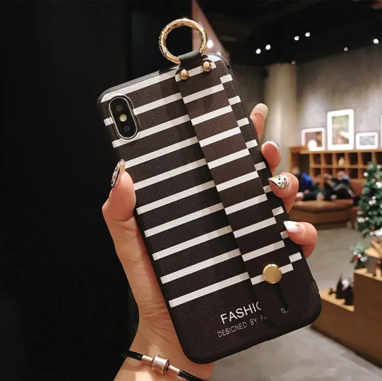 Samsung Galaxy TPU phone case with a folded-out bracket stand on a table.