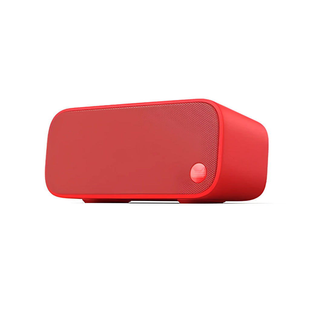 Elf Sugar Cube Artificial Intelligence Speaker in blue, green, red, or white plastic bookshelf design