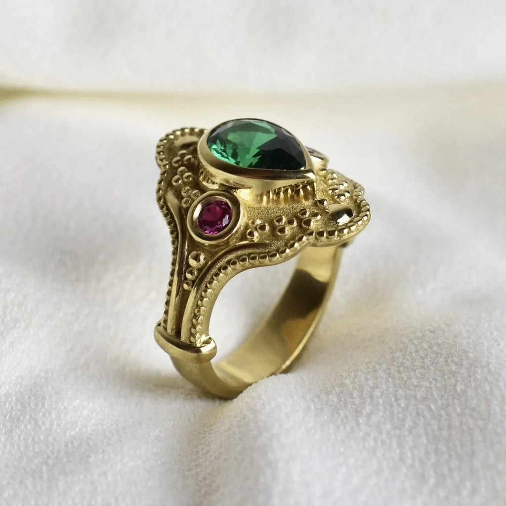 Golden geometric ins style women's alloy ring on a white background showing its electroplated finish.