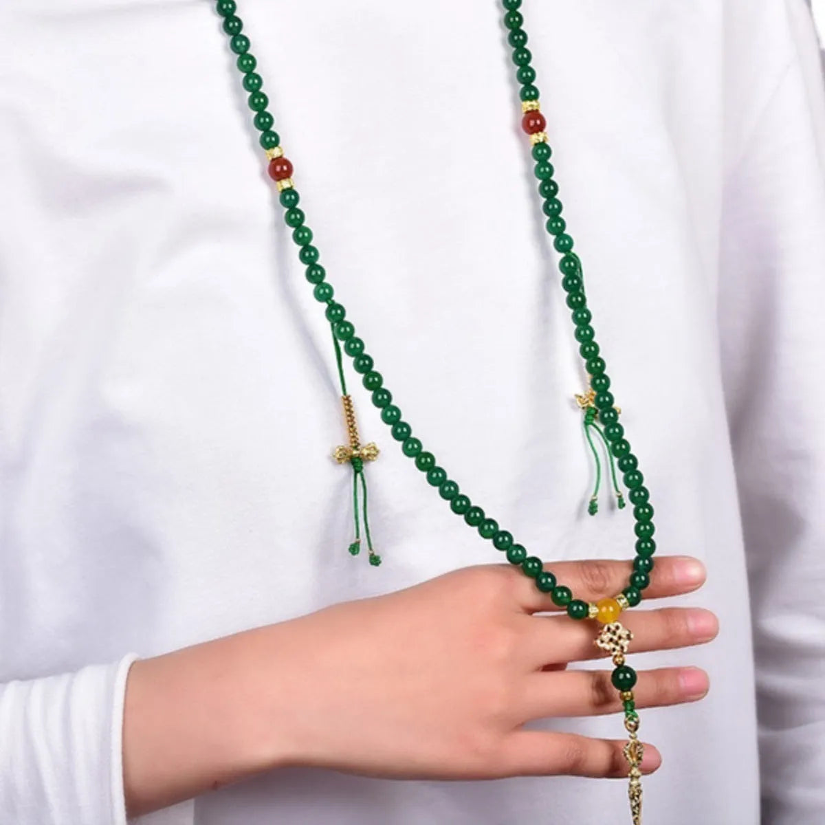 Brazilian natural green agate multi-circle bracelet for men and women on a wrist.